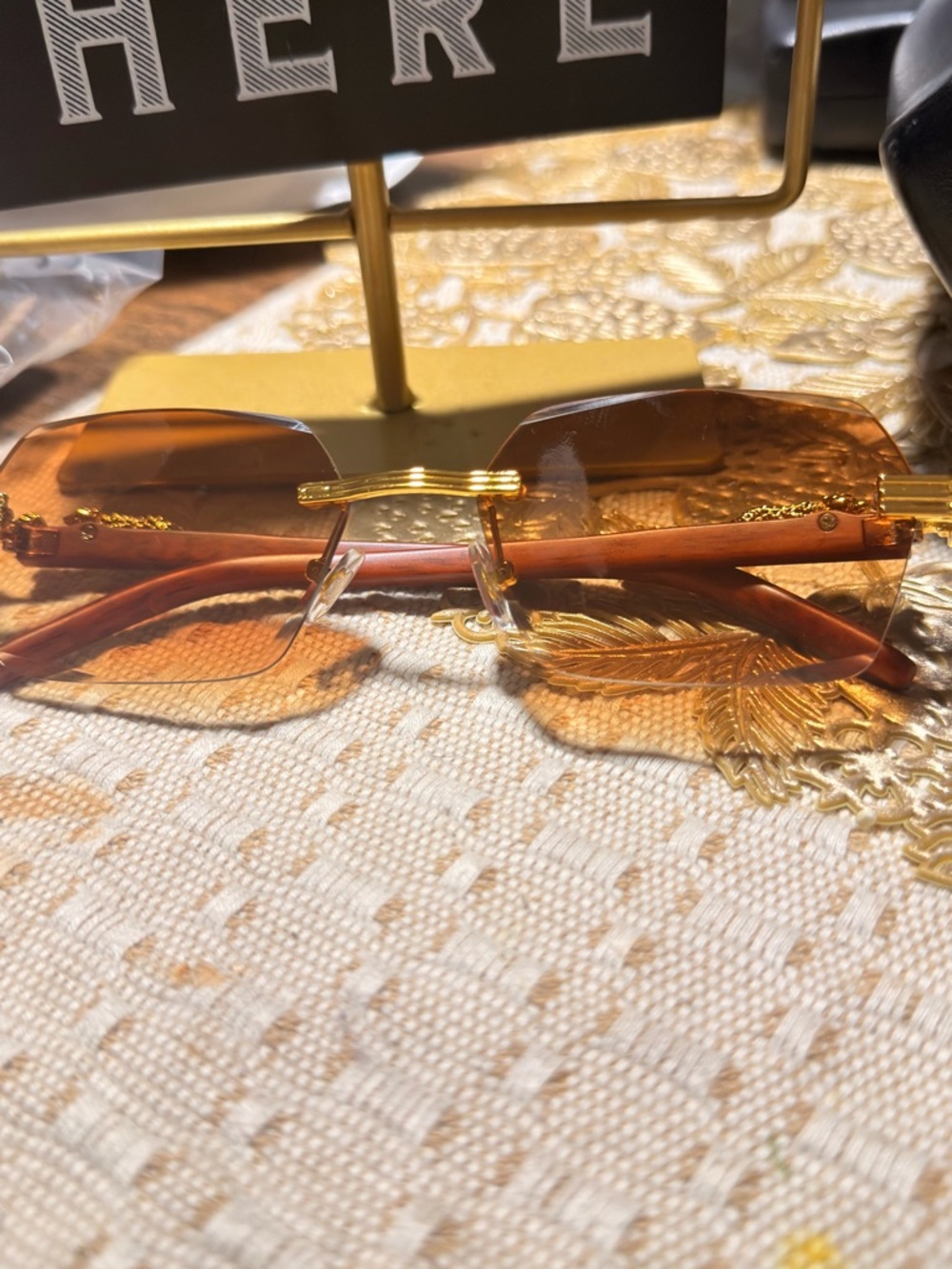 Rimless Amber Gradient Sunglasses with Gold Accents